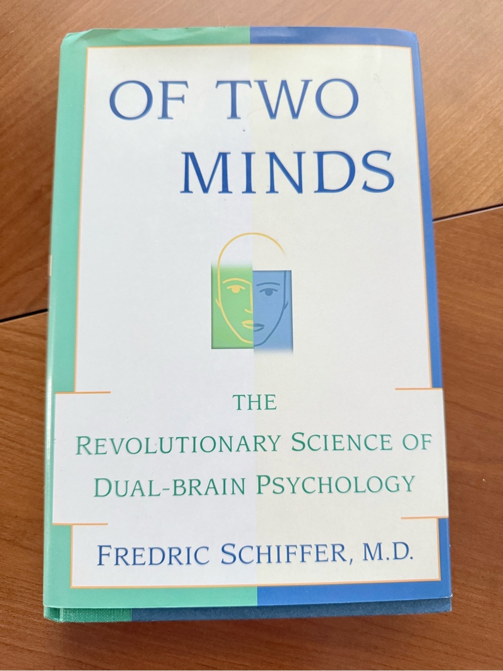 Hardcover book titled "Of Two Minds" by Fredric Schiffer, M.D.
